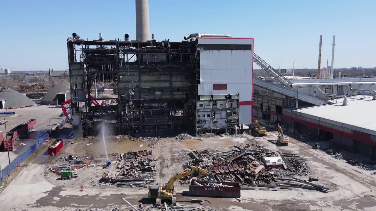 Demolish process of garbage incinerator in Detroit, aerial drone view