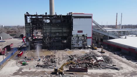 demolish process of garbage incinerator in detroit, aerial drone view