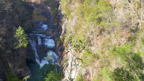 Panning-aerial-shot-of-waterfalls-in-a-gorge-in-Georgia