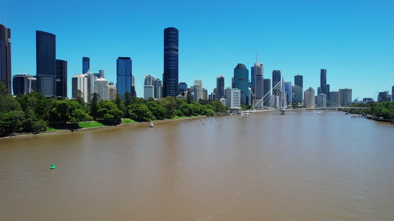 Brisbane city skyline over river, sunny day from Kangaroo Point Cliffs Park