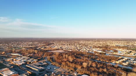 an aerial view over a waste water treatment facility on a beautiful day with blue skies