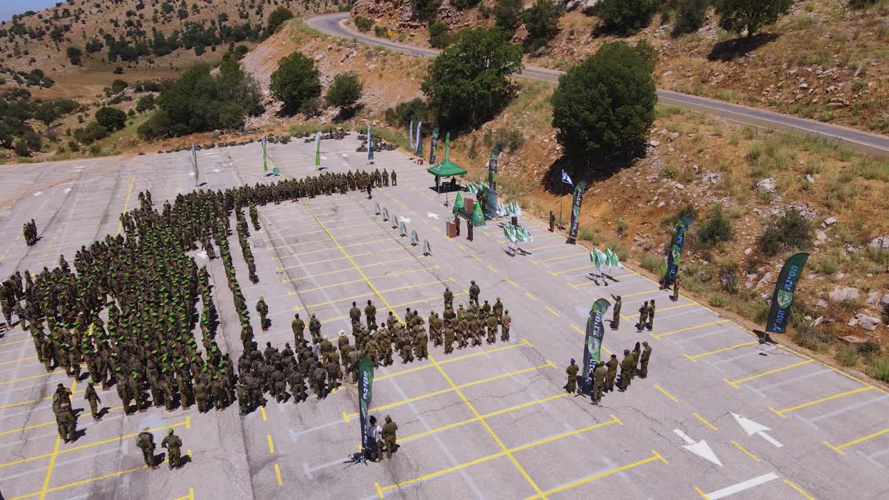 Israel reservist Brigade stand too for daily muster parade during Gaza deployment
