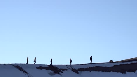 hiking over sand dunes on a sunny day