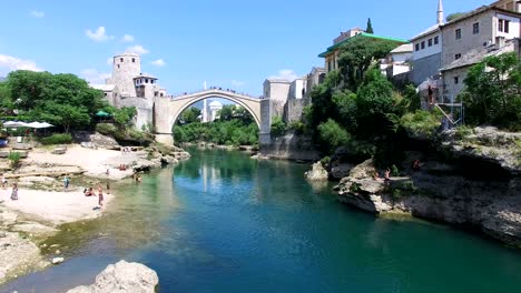 flying towards famous bridge in mostar, bosnia and herzegovina