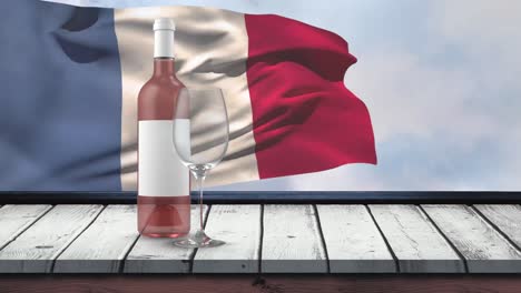 Animation-Einer-Flasche-Roséwein,-Eines-Glases-Und-Einer-Flagge-Frankreichs,-Die-über-Einem-Hintergrund-Mit-Wolken-Weht