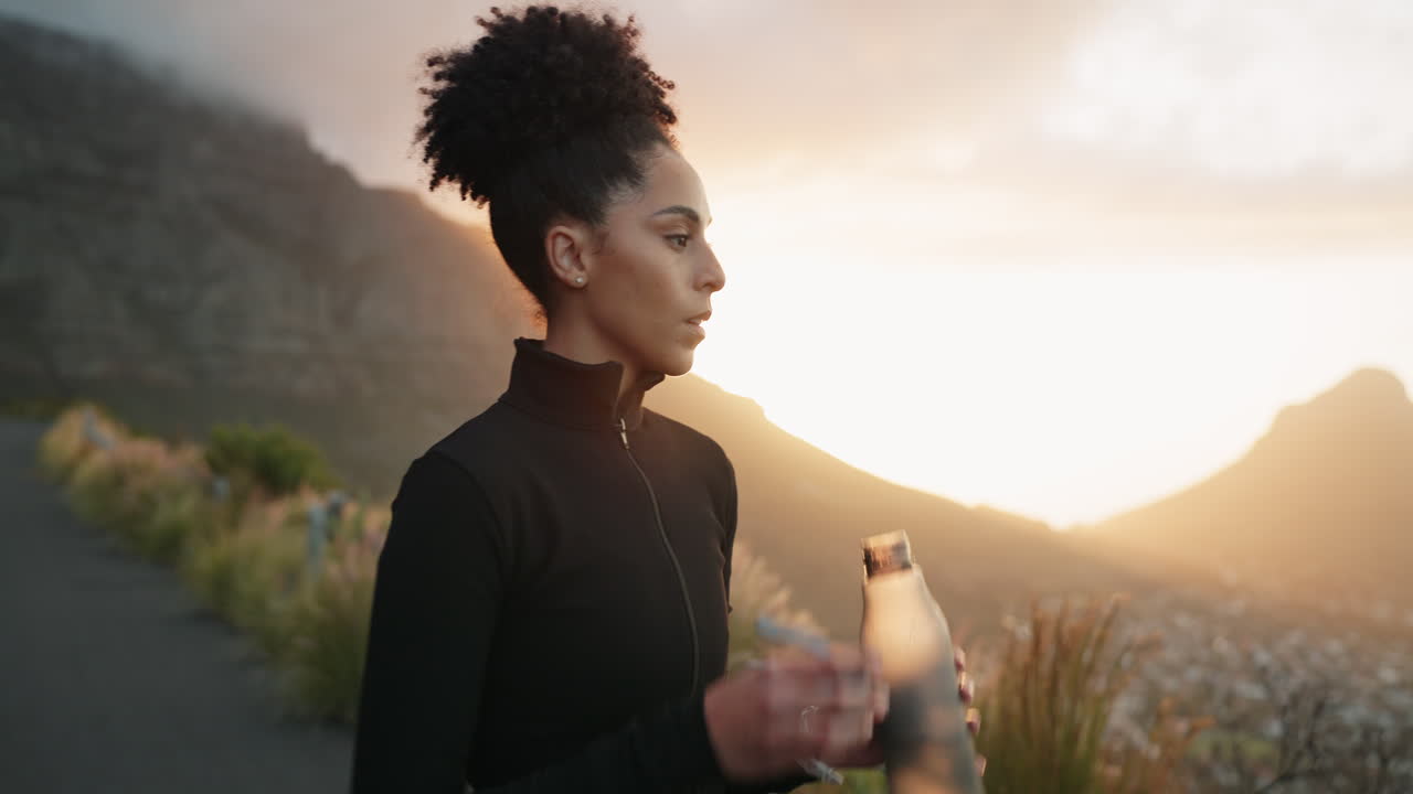 Black woman, athlete and drinking water