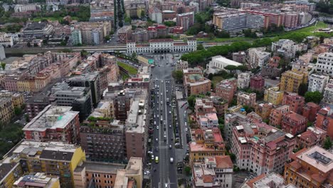 cinematic establishing drone shot above roma trastevere train station in rome, italy