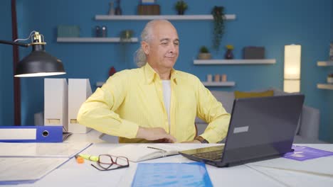 Home office worker old man attending online business meeting.