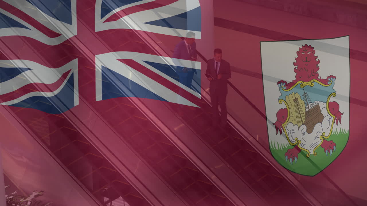 In office building, Bermuda flag and coat of arms overlaying people on escalator