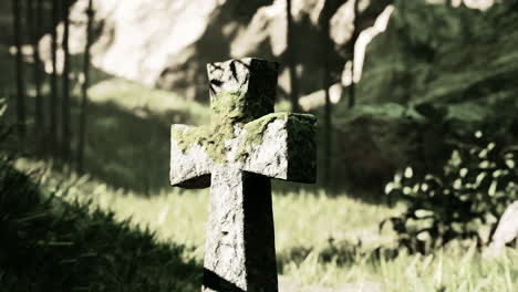 stone cross in a forest