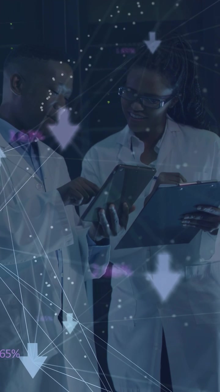 Vertical video: Man tapping tablet, woman with clipboard, overlay showing % guiding lab data review