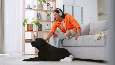 Phone,-headphones-and-laughing-woman-with-dog