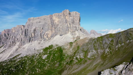 picturesque mountain peak landscape in italian dolomites on sunny summer day with blue skies, aerial