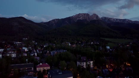 night time flyover of zakopane, poland, a resort town against the tatra mountains, and its stunning goral traditional architecture-1