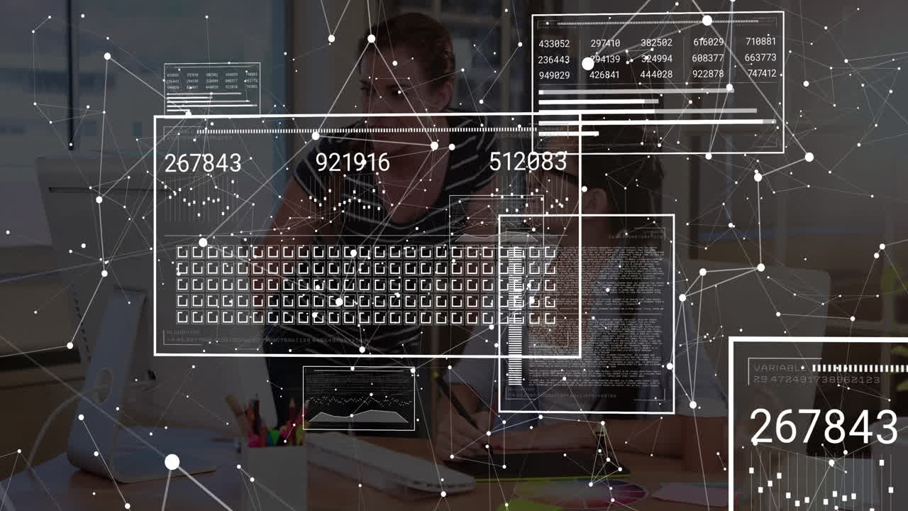 Coworkers collaborating at desk, taking notes, analyzing business charts with data overlays