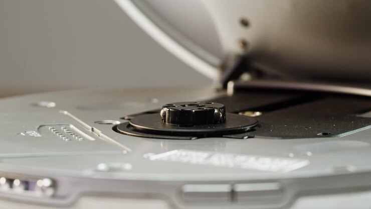 Vintage cd music player close-up. Using portable music player for listening with compact disc