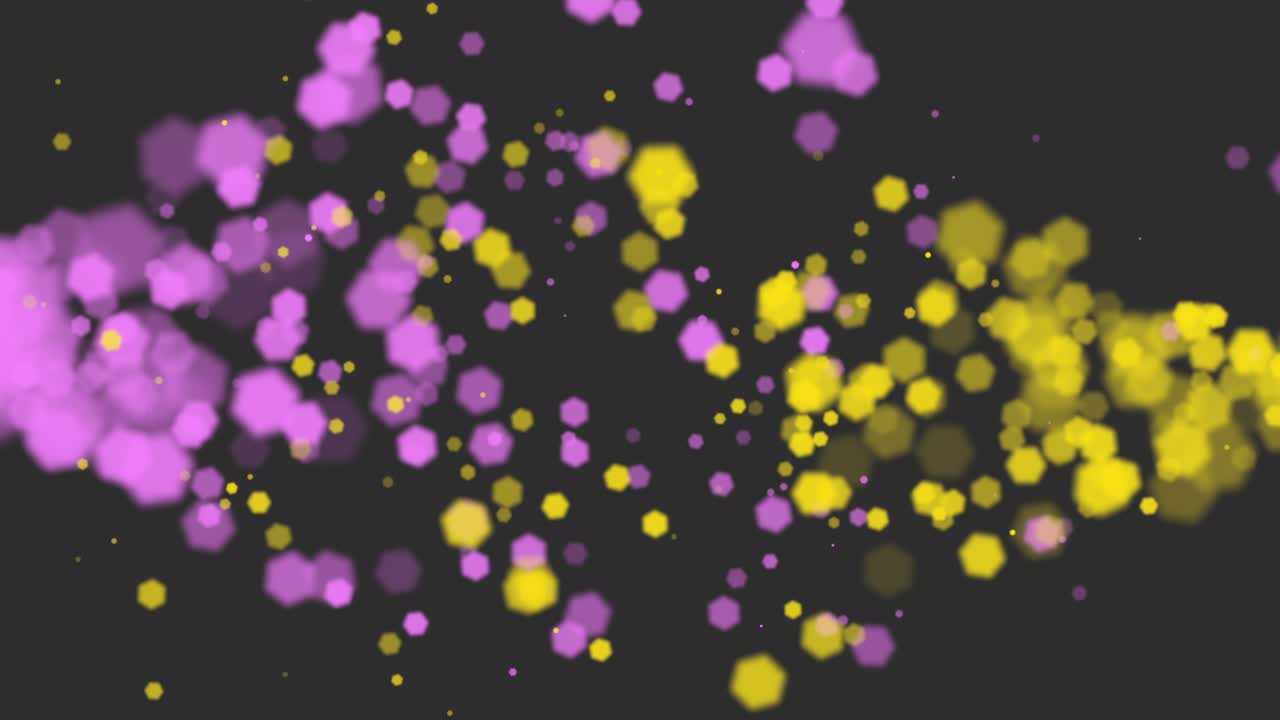 반이는 배경에 입자와 함께 노란색과 분홍색 bokeh 비행