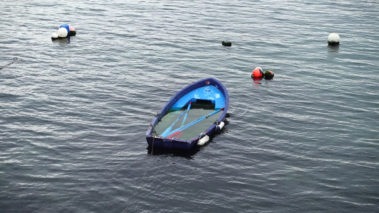 The drowned boat in the ocean. Atlantic Ocean
