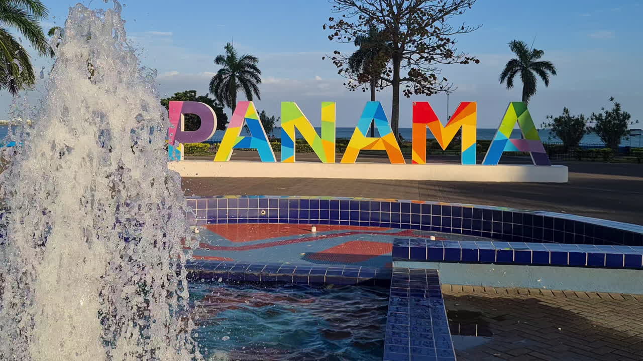 Panama City Landmark Sign and Fountain in Oceanfront Park on Golden Hour Sunlight