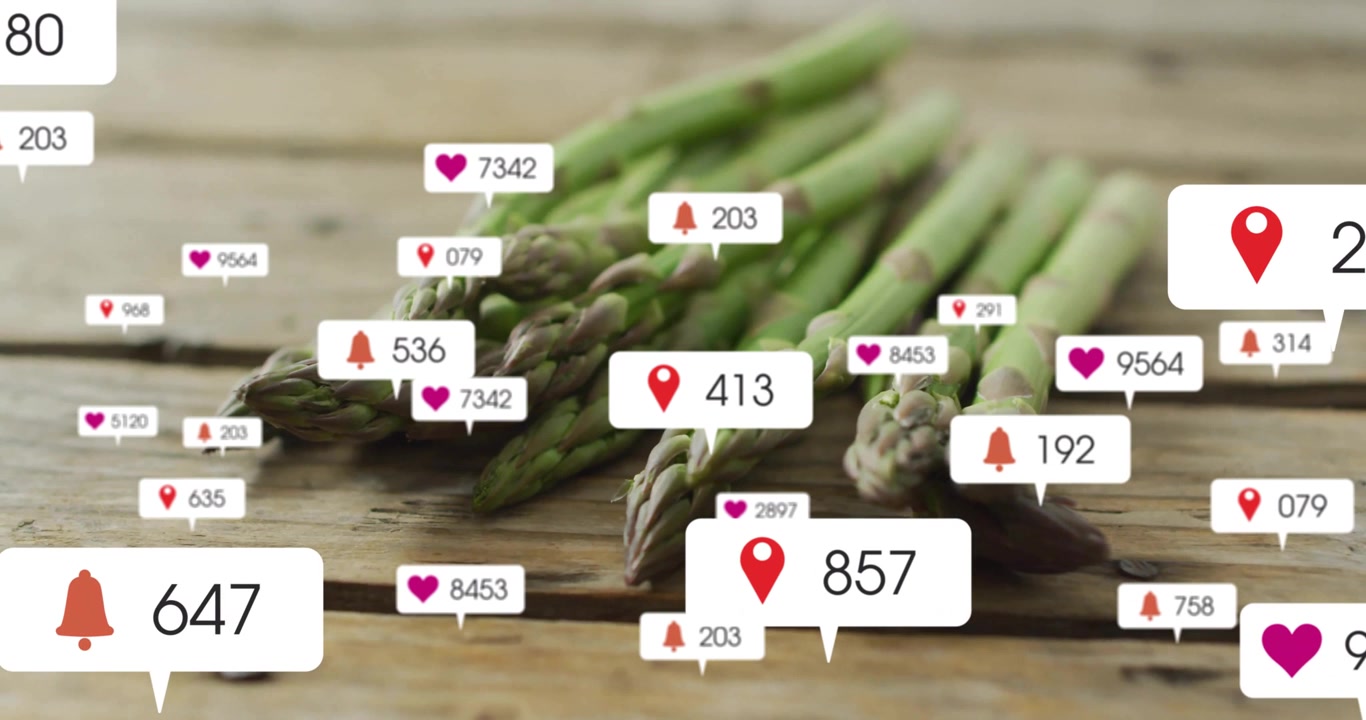 Opening asparagus on tabletop starting icons swirling then fading, highlighting social engagement