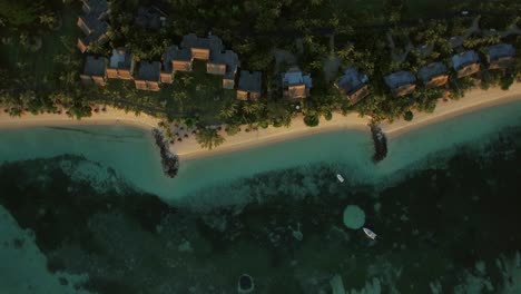 aerial shot of island oceanfront with villas mauritius