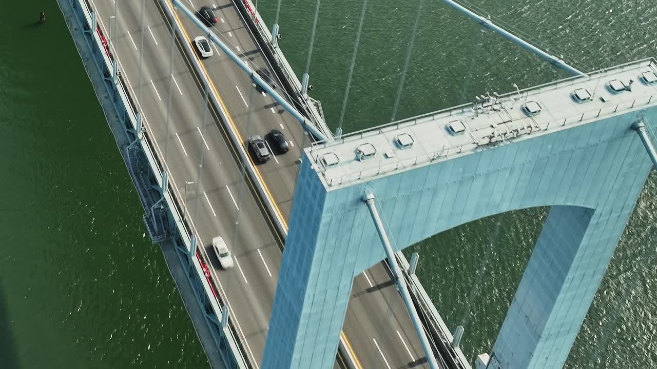 Aerial view of a busy bridge over water in New York City