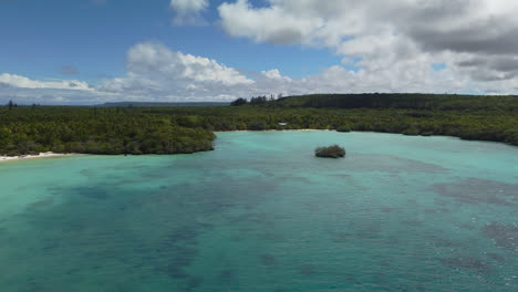 tropical new caledonia island turquoise sea and idyllic quiet beaches, 4k aerial