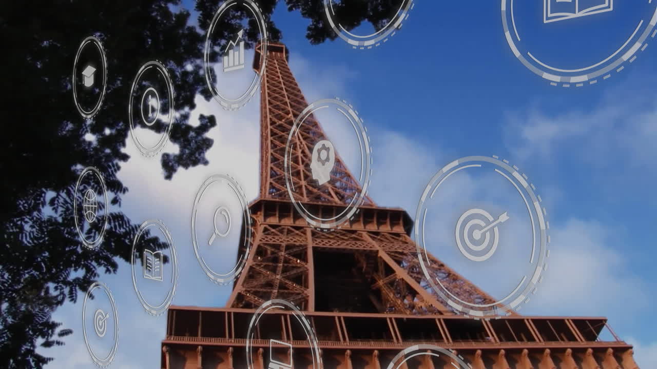 Eiffel Tower with animation of digital icons representing technology and communication
