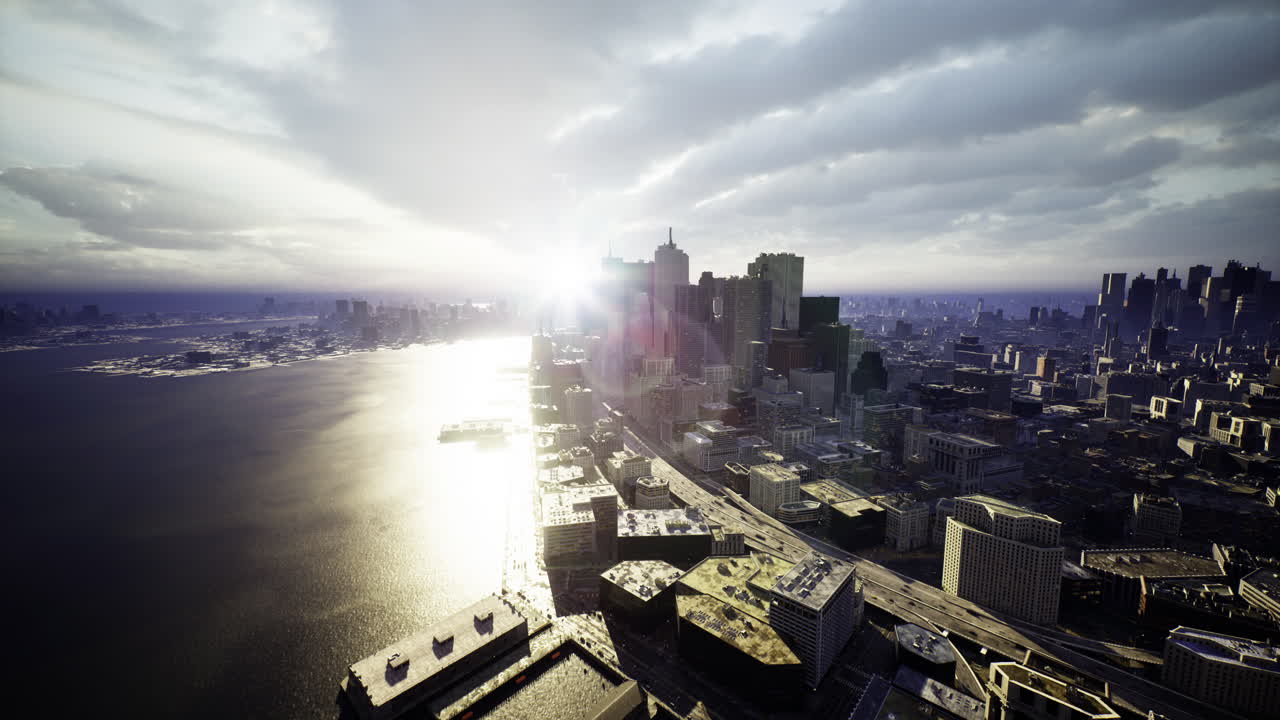 City skyline with sunlight reflecting on water during sunset