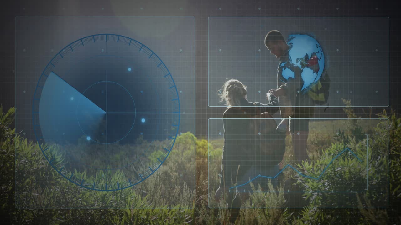 couple stepping rotating radar wedge while syncing globe overlay during tech hillside ascent
