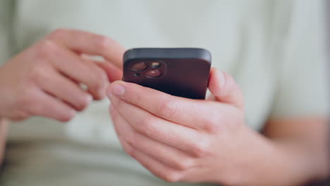 Man-hand-with-phone-on-social-media-app-reading