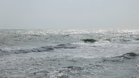 short clip of rhythmic sea waves hitting the beach