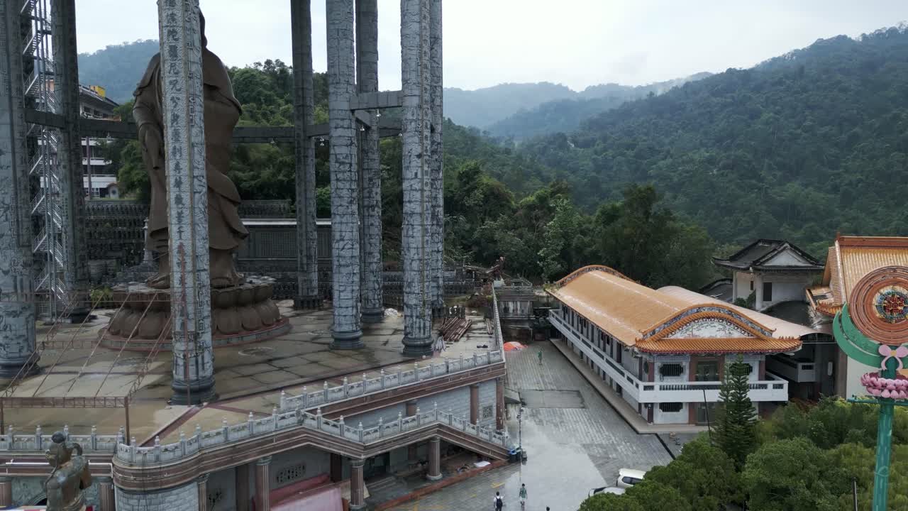 Giant Buddha Statue at a Mountain Temple in Southeast Asia