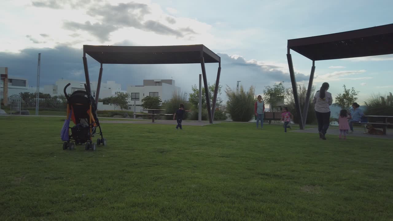 The sun is gone but the kids want to keep playing at the park