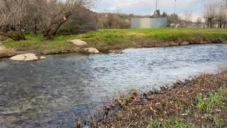 upstream shot of the vade river near ponte da barca in portugal.