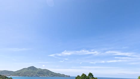 panoramic view of tropical beach and lush greenery in phuket, thailand
