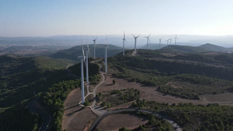 drone shot of a wind farm for eolic energy production in catalonia, spain