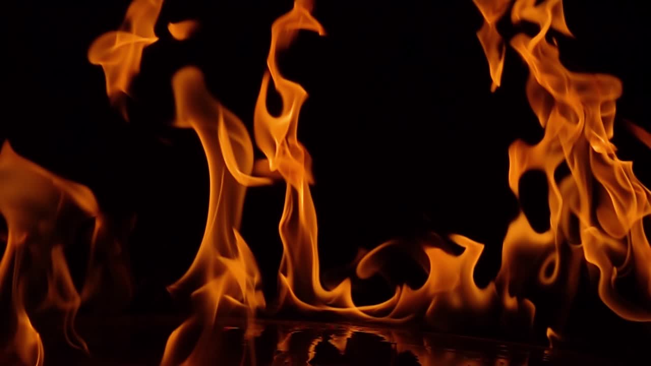 Flames of fire on black background in slow motion