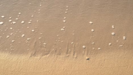 escribe sol en la playa.