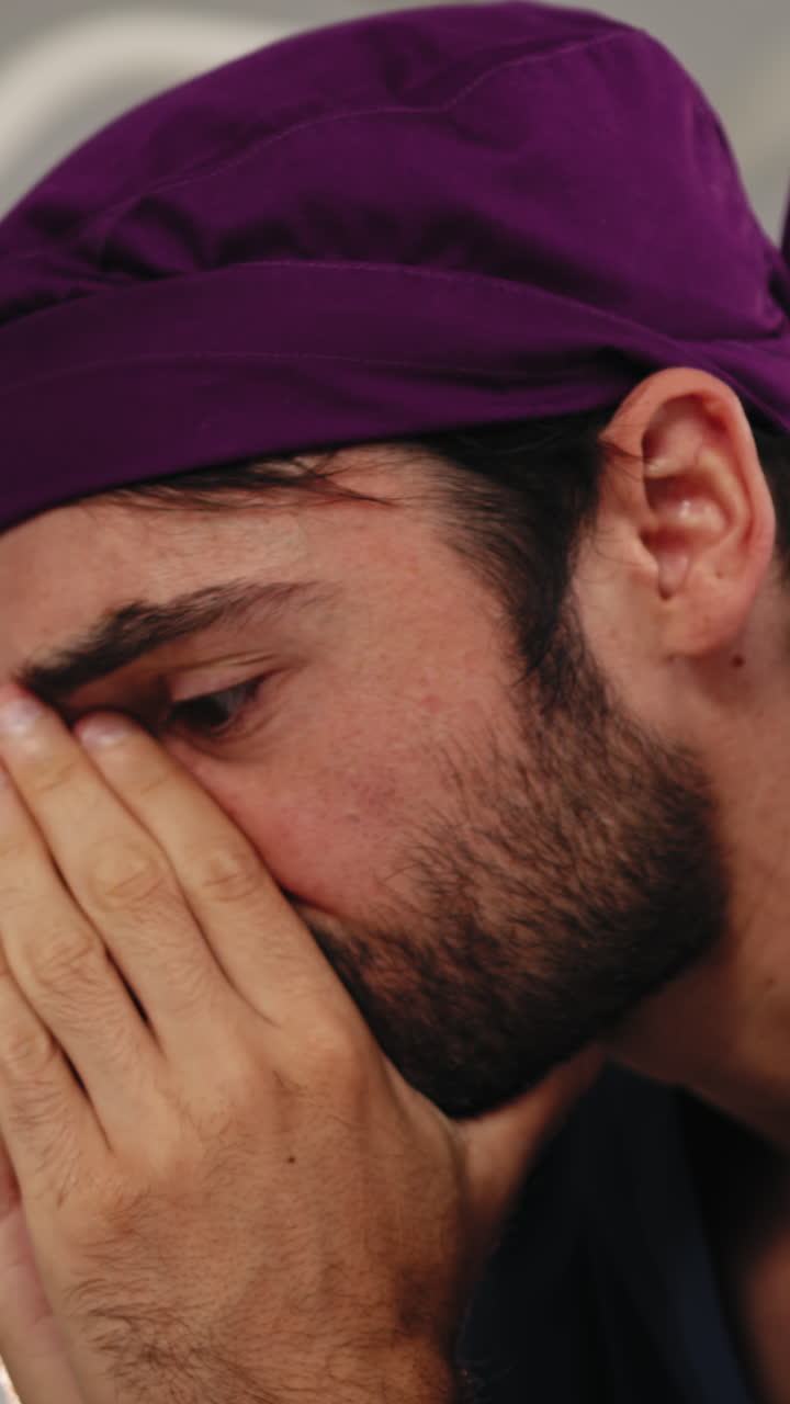 Thoughtful doctor with covered face