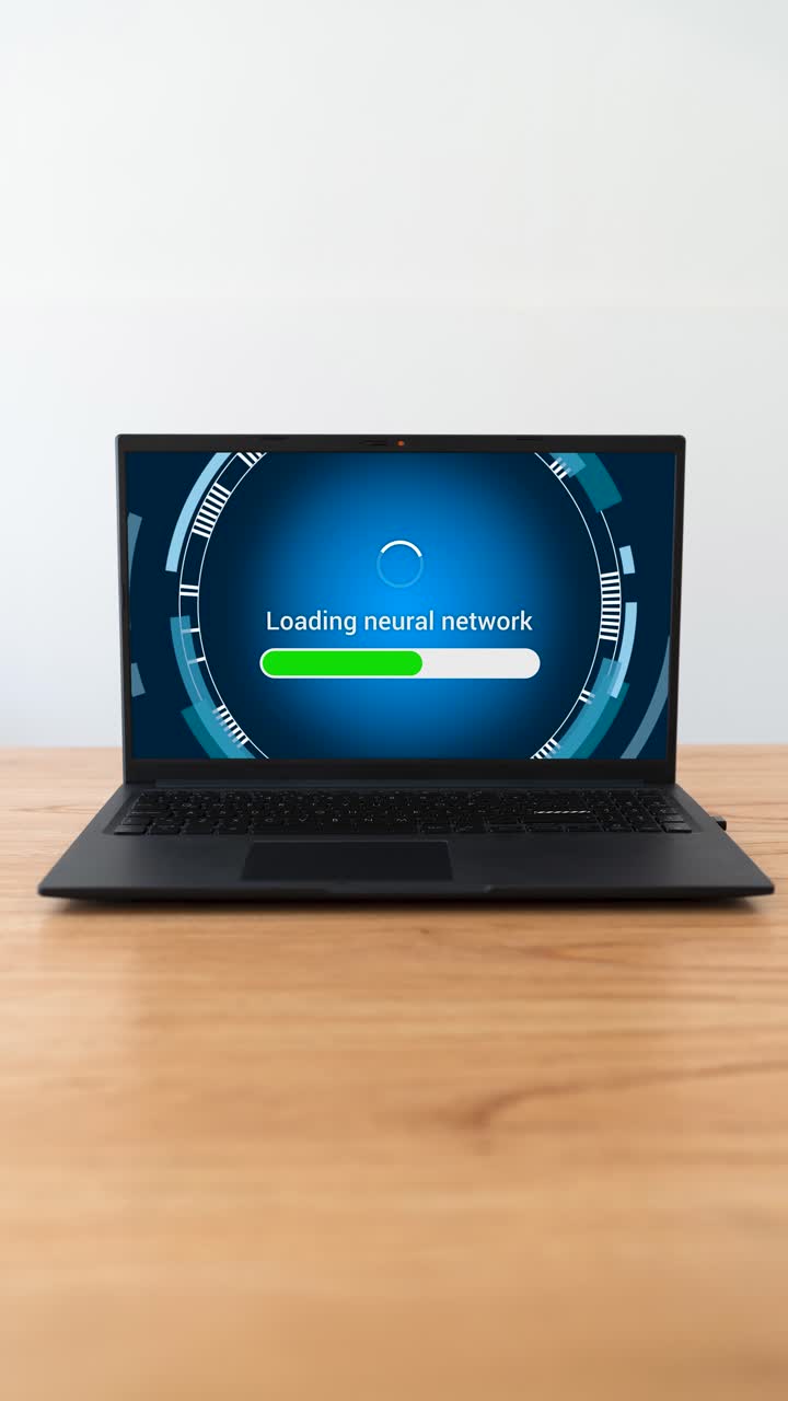 Laptop loading neural network to work with artificial intelligence. Vertical shot.