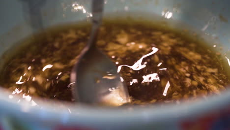 Mixing-a-bowl-of-soy-sauce-in-slow-motion