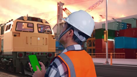 engineer monitoring train at port