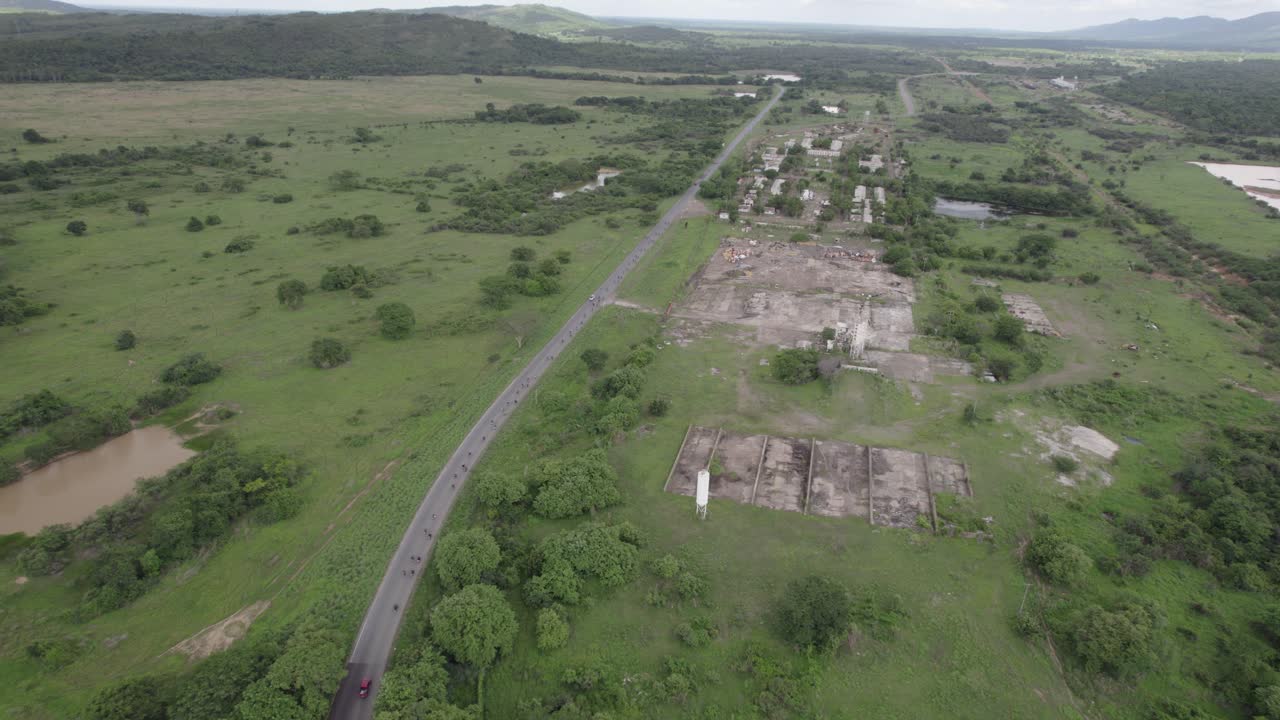 Aerial view of highway through lush rural Venezuela landscape