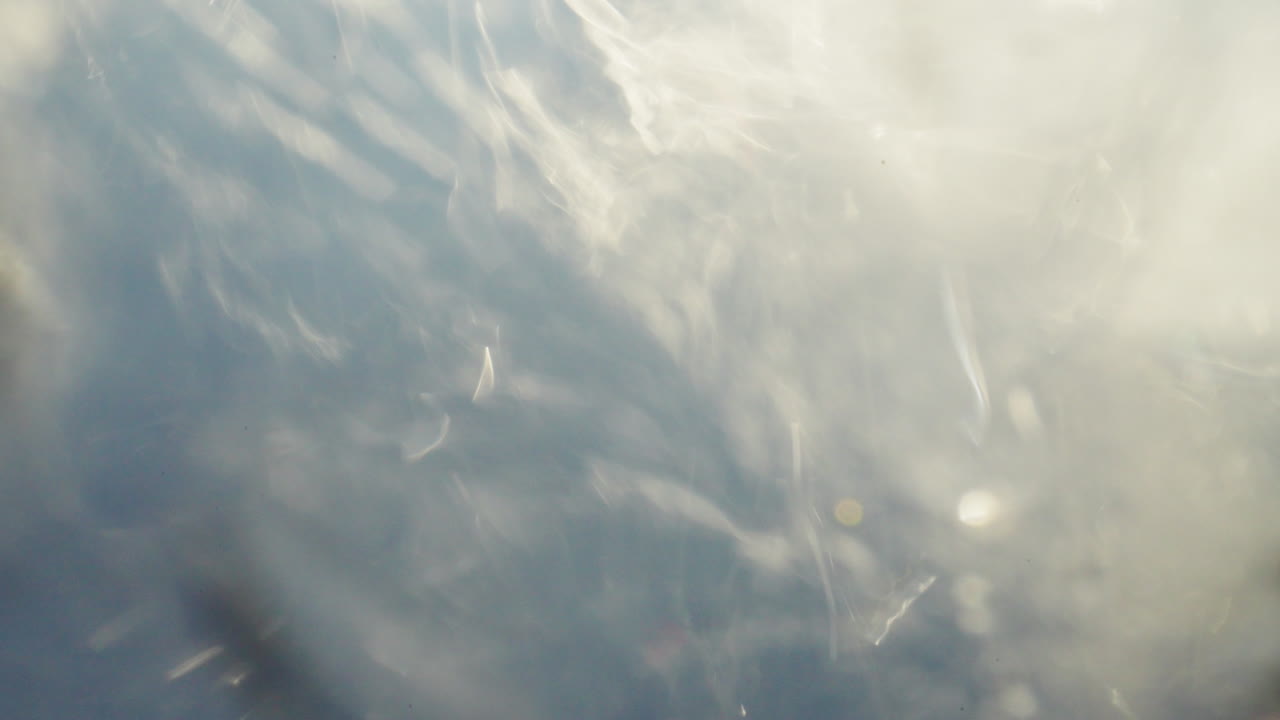 Cloudy Sky with Sunlight Reflections