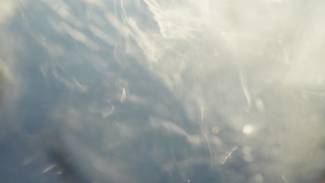 cloudy sky with sunlight reflections