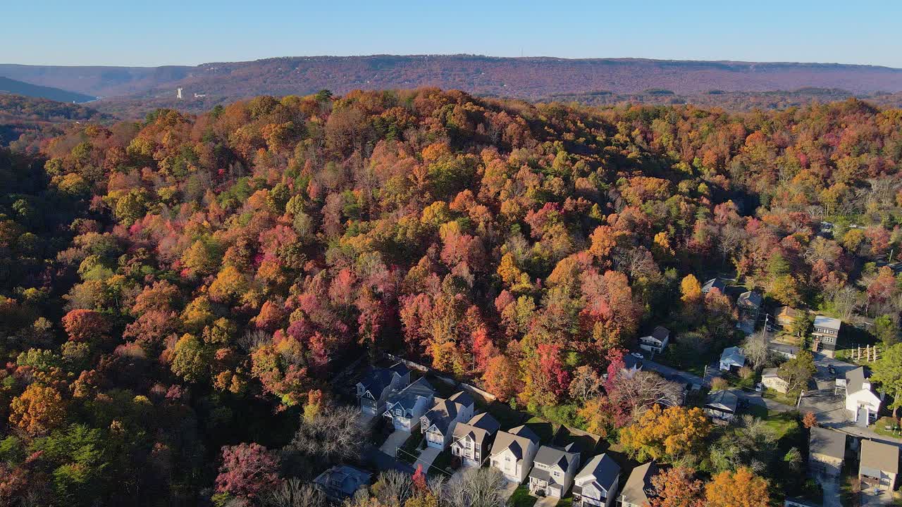 Typical American residential homes surrounded with forest in autumn colors, Chattanooga Tennessee, USA