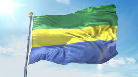 bandera de gabón ondeando en el viento contra el cielo azul profundo. tema nacional, concepto internacional. render 3d bucle sin costuras 4k