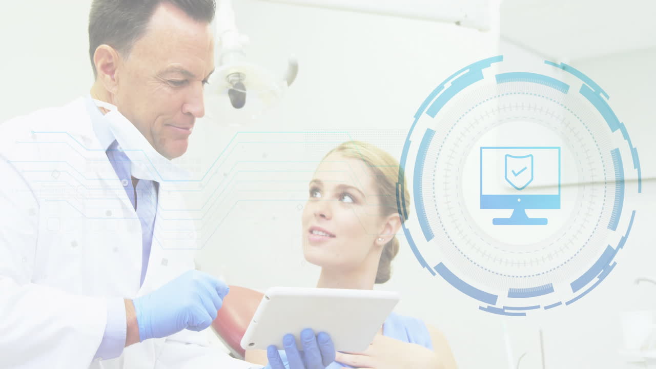 Gloved doctor reviewing patient data on medical tablet under exam lamp, showing shield icon overlay