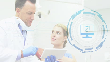 gloved doctor reviewing patient data on medical tablet under exam lamp, showing shield icon overlay